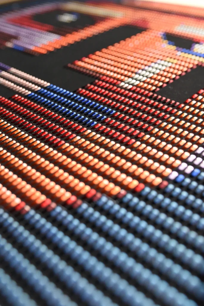 Starboy edition S by Zolo Kis — low-angle detail of orange and blue ridges along the face