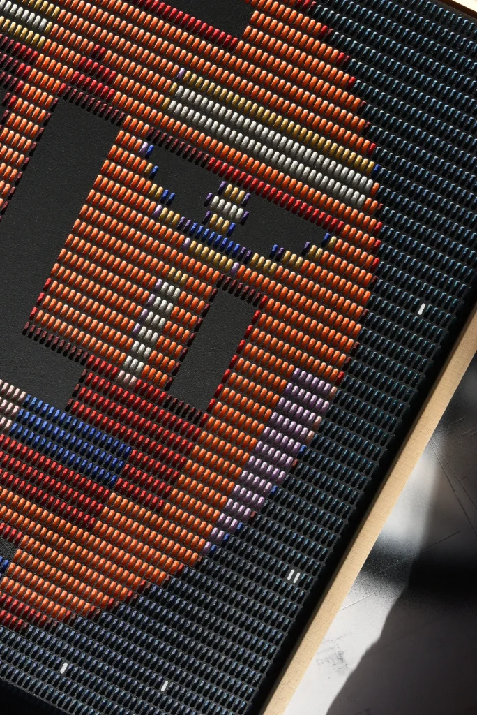 Starboy edition S by Zolo Kis — angled portrait detail showing the eyes, nose and wooden frame
