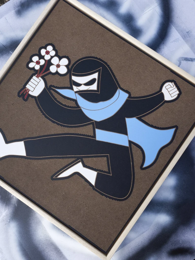 Tinder Ninja edition S by Zolo Kis — framed black-clad ninja with a blue scarf and white flowers against a brown background