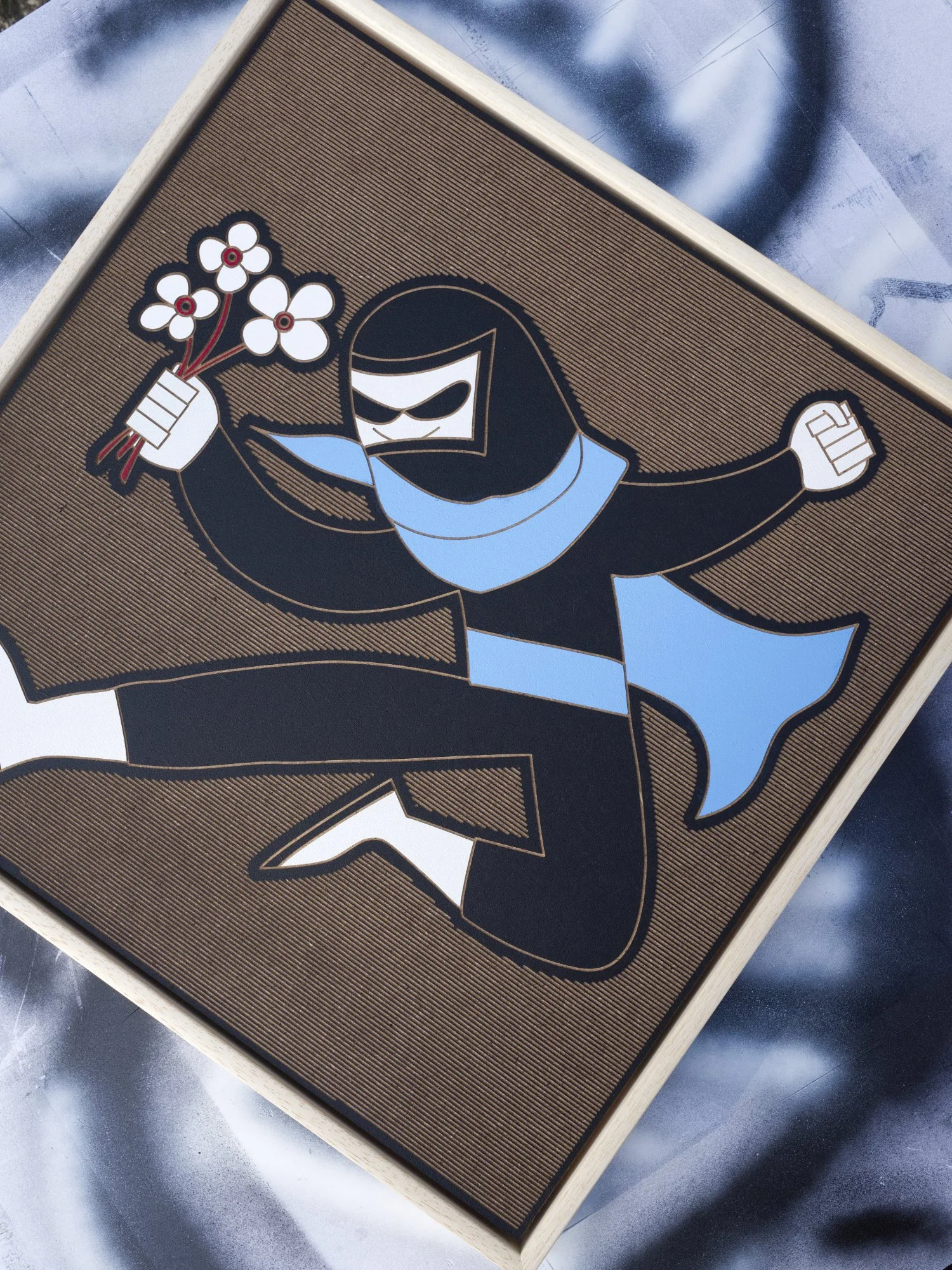 Tinder Ninja edition S by Zolo Kis — framed black-clad ninja with a blue scarf and white flowers against a brown background