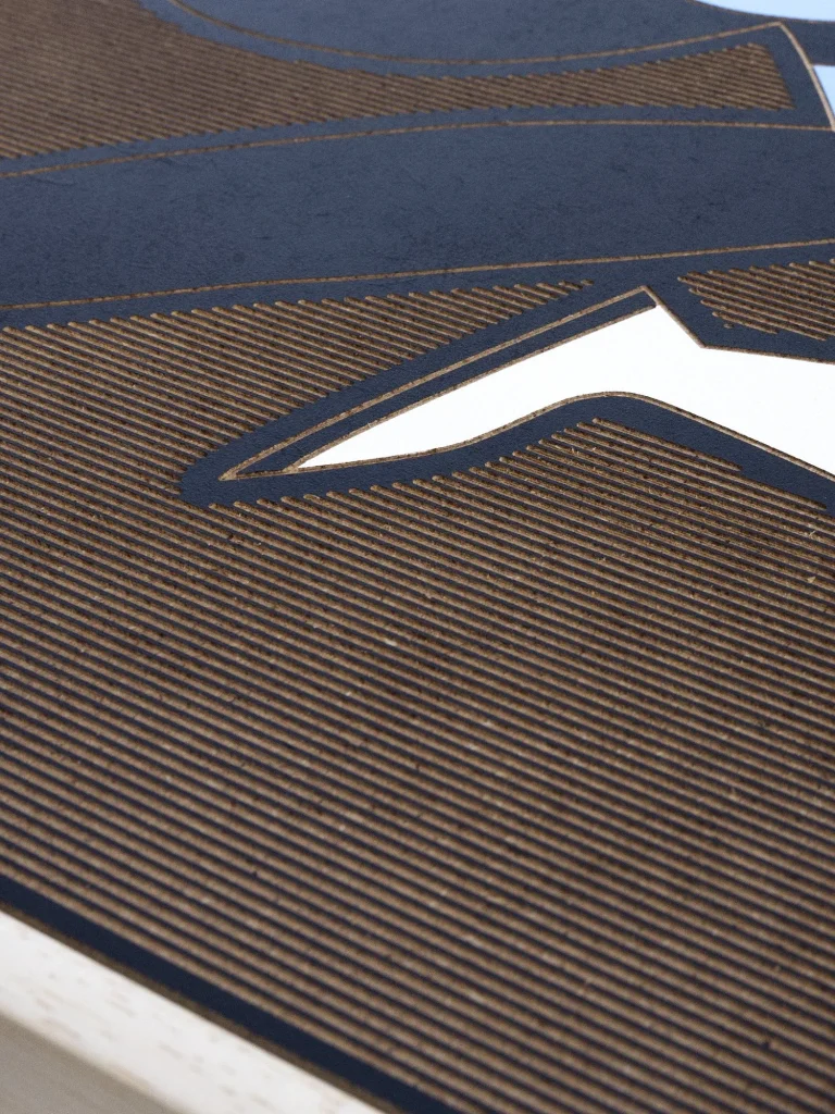 Tinder Ninja edition S by Zolo Kis — close-up of a white shoe and fine ridges in the brown background