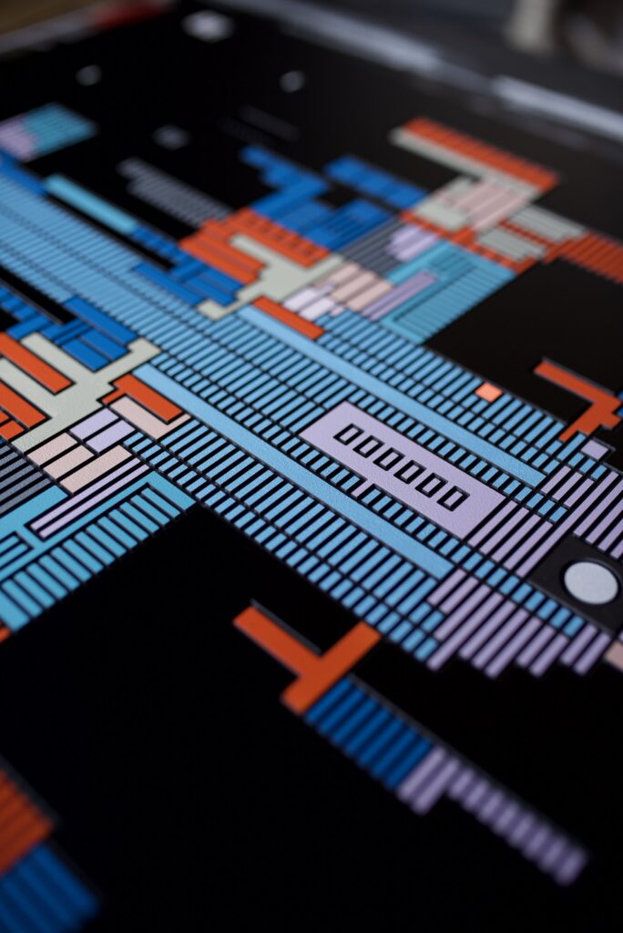 Zolo Kis artwork — close-up of blue, pale pink and orange relief lines on a black panel