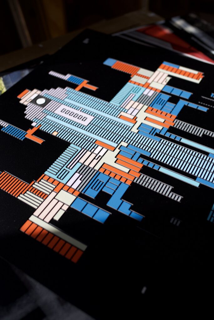 Zolo Kis artwork — angled view of the blue and orange spacecraft on a black background
