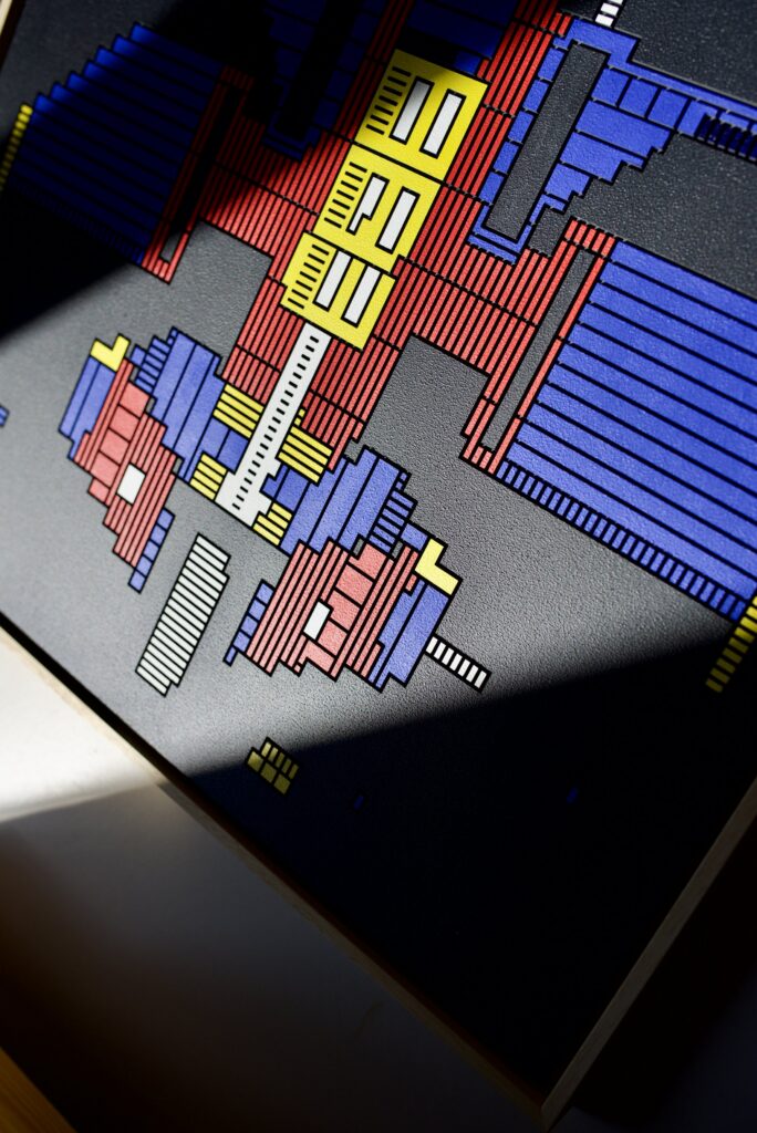 Zolo Kis artwork — angled detail of blue ridges, yellow windows and red painted areas
