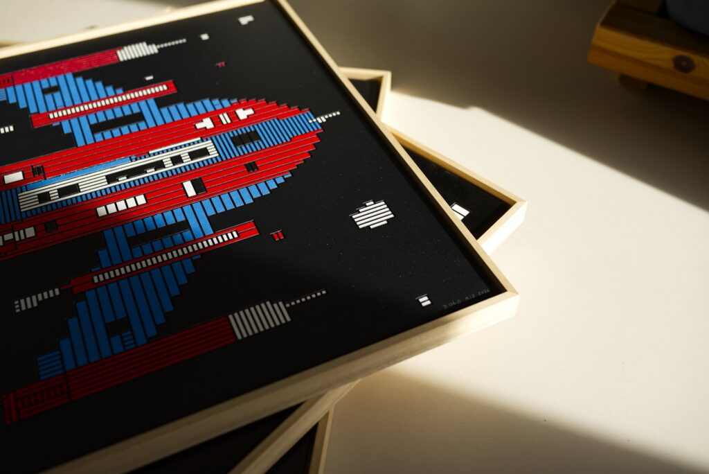 Zolo Kis artwork — close-up of red shapes and pale rectangular windows