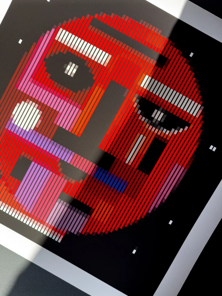 Starboy fine art print — circular red and purple face viewed at an angle in sunlight