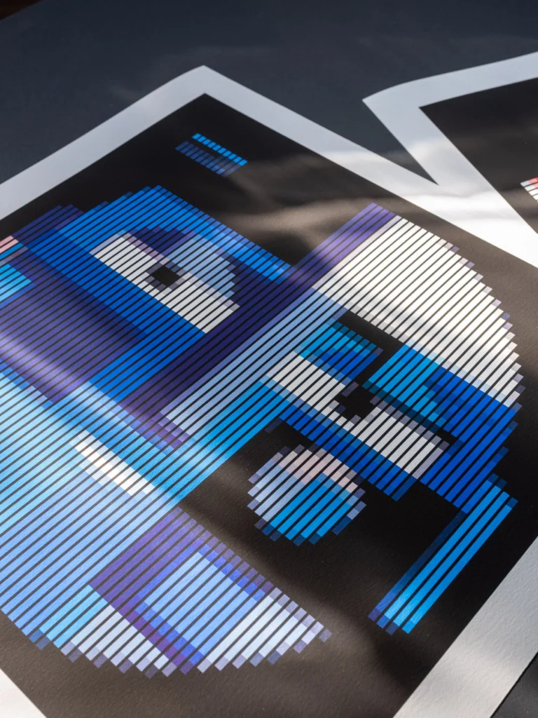 The Healer fine art print — blue and white face with a white mount, photographed at an angle