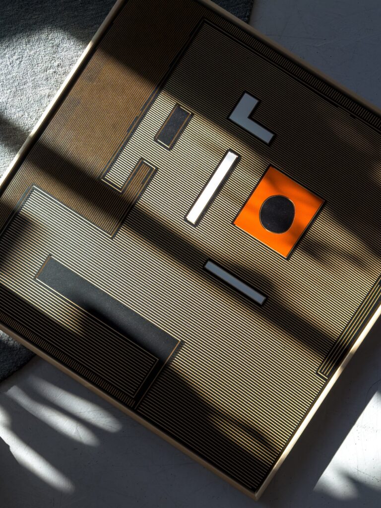 Mr.Dog - ZAK by Zolo Kis — angled view of the framed dog portrait in sunlight