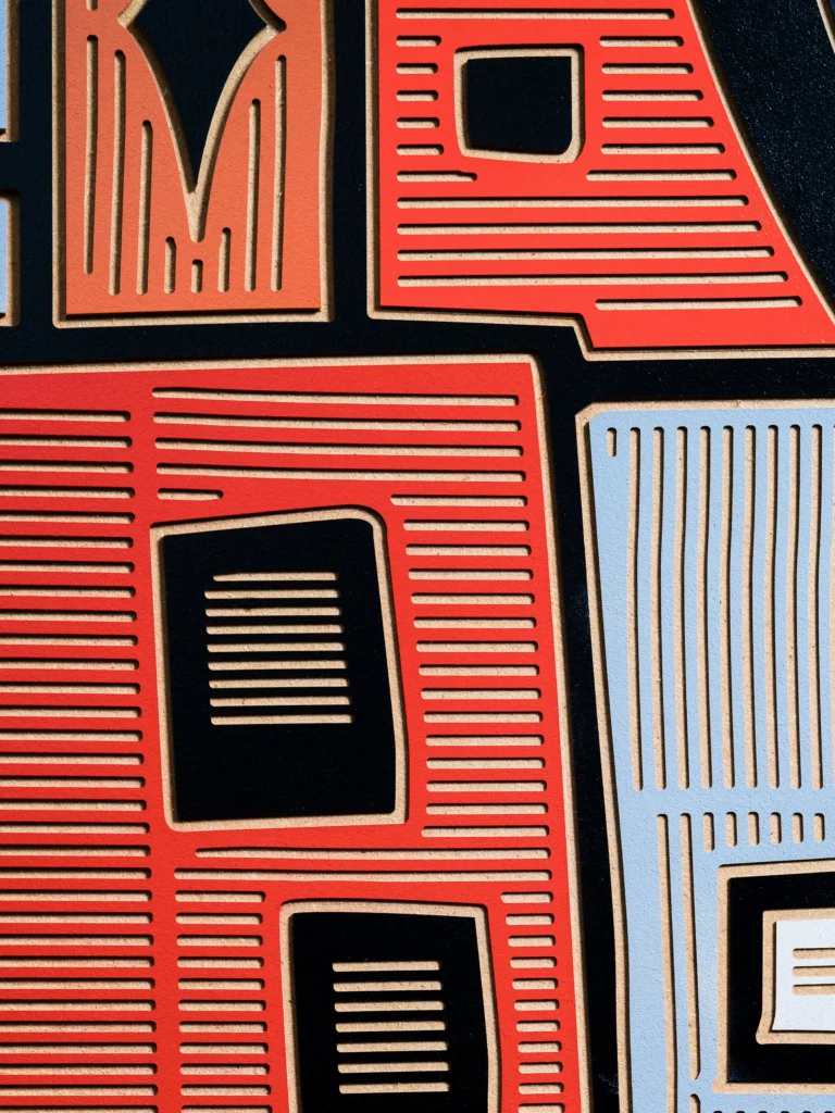Bad Boy by Zolo Kis — close-up of red, blue and pale rectangular milled patterns