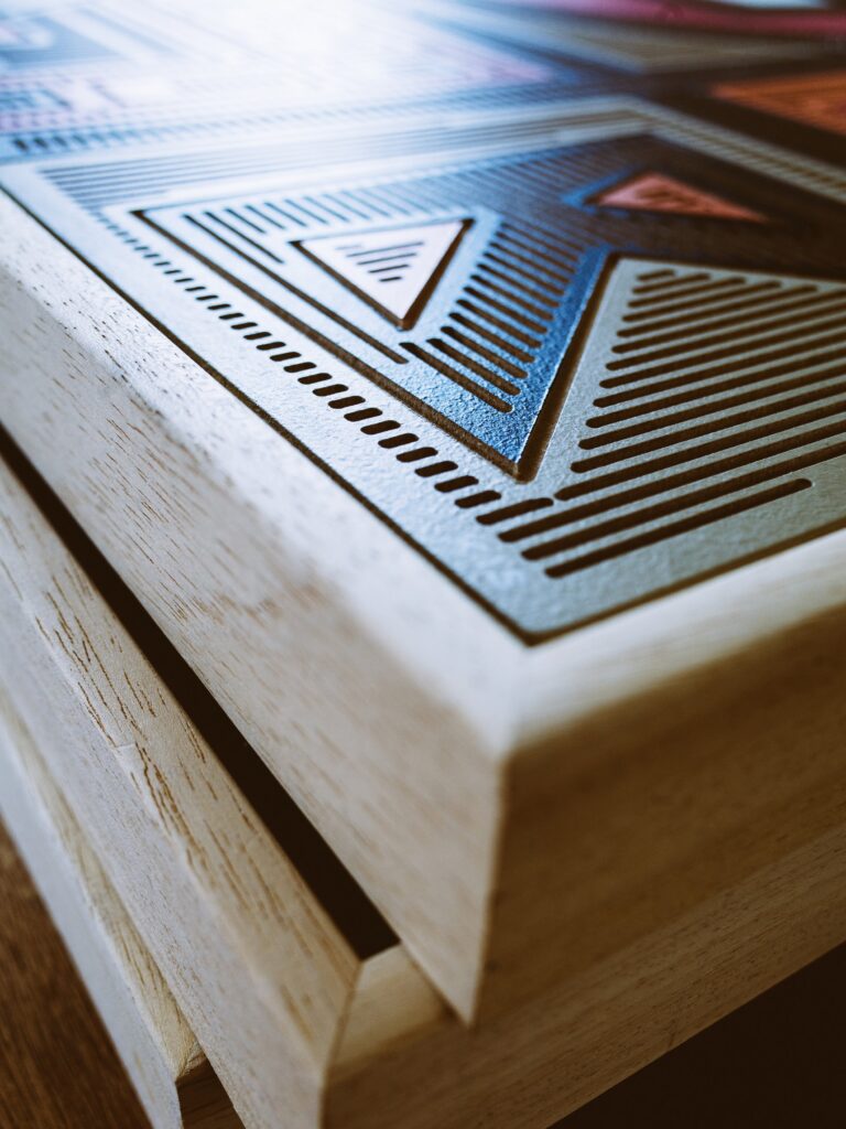 Backstabbed Boy by Zolo Kis — close-up of the wooden frame corner and triangular milled pattern