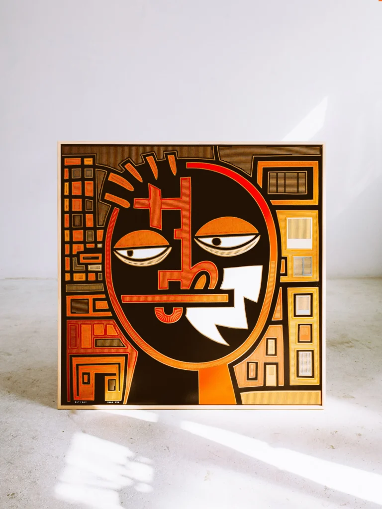 Butt Boy by Zolo Kis — framed black, white and orange face with half-closed eyes and a background