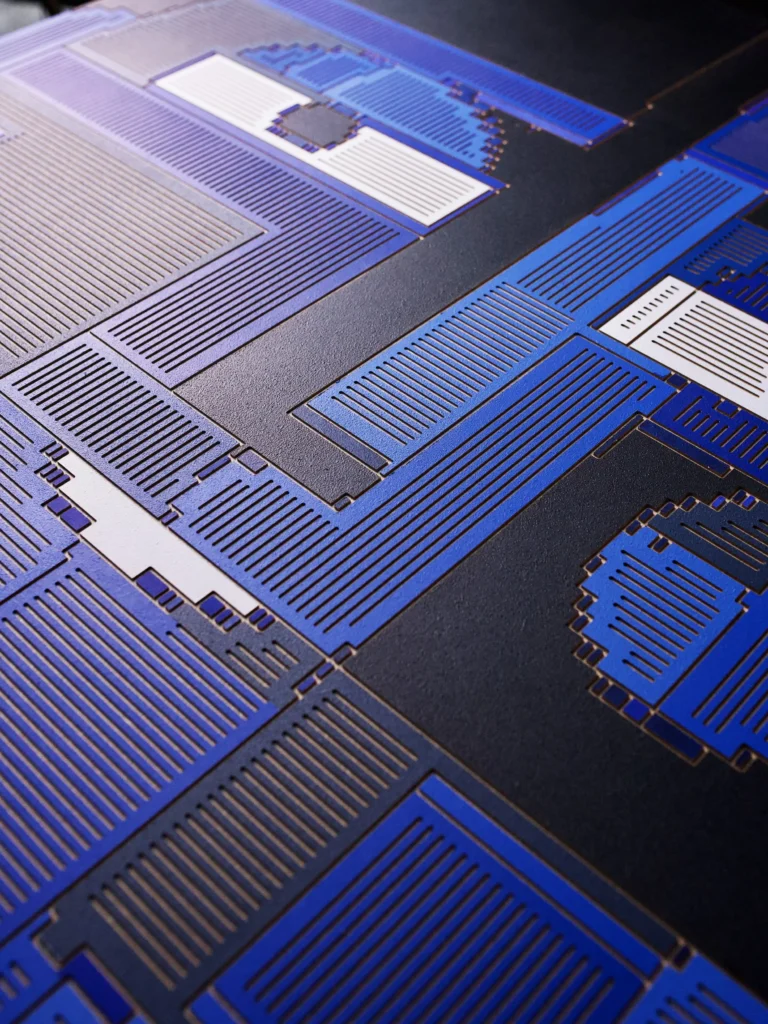 The Healer original artwork — close-up of layered blue and pale details under angled light