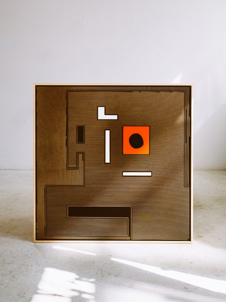 Mr.Dog - ZAK by Zolo Kis — framed brown dog face with white lines and an orange square around a black circle