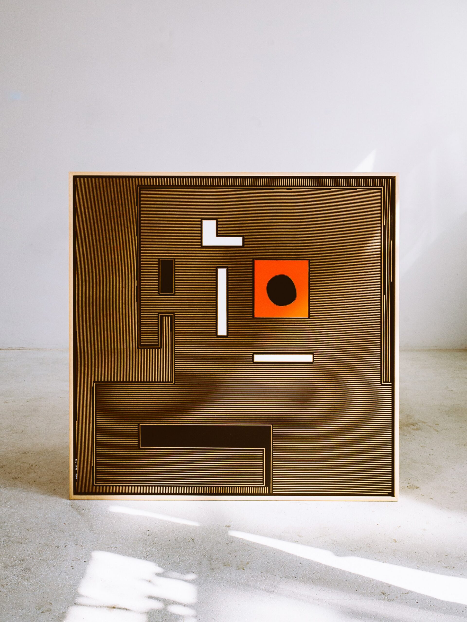 Mr.Dog - ZAK by Zolo Kis — framed brown dog face with white lines and an orange square around a black circle