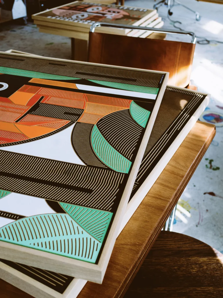 Oldschooler by Zolo Kis — angled view of the portrait lying on a wooden table